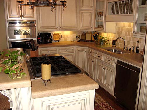 Beautiful remodeled kitchen with limestone countertops, custom glazed finished cabinetry and top-of-the-line GE Monogram stainless appliances!