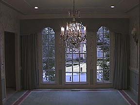 Elegant Dining Room with Full Sized Arched Windows