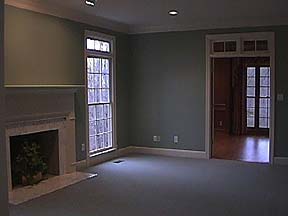 Large Living Room with Masonry Fireplace, Wet Bar and Adjacent to the Study!