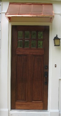 Beautiful Copper Awning Over Front
                            Door